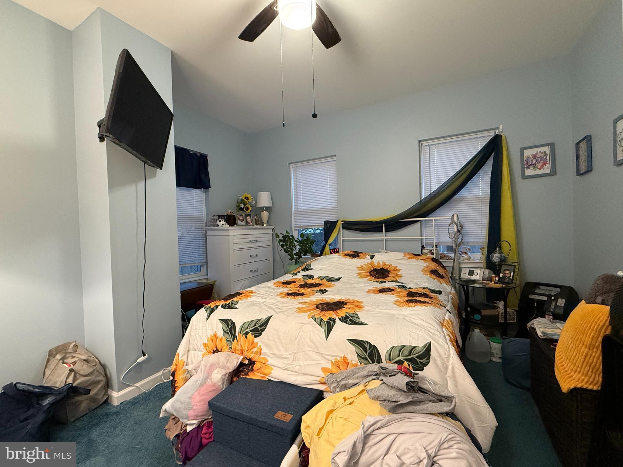 438 Main Street Red Hill, PA 18076 - Photo 21 of 29 a bedroom with bed and mirror