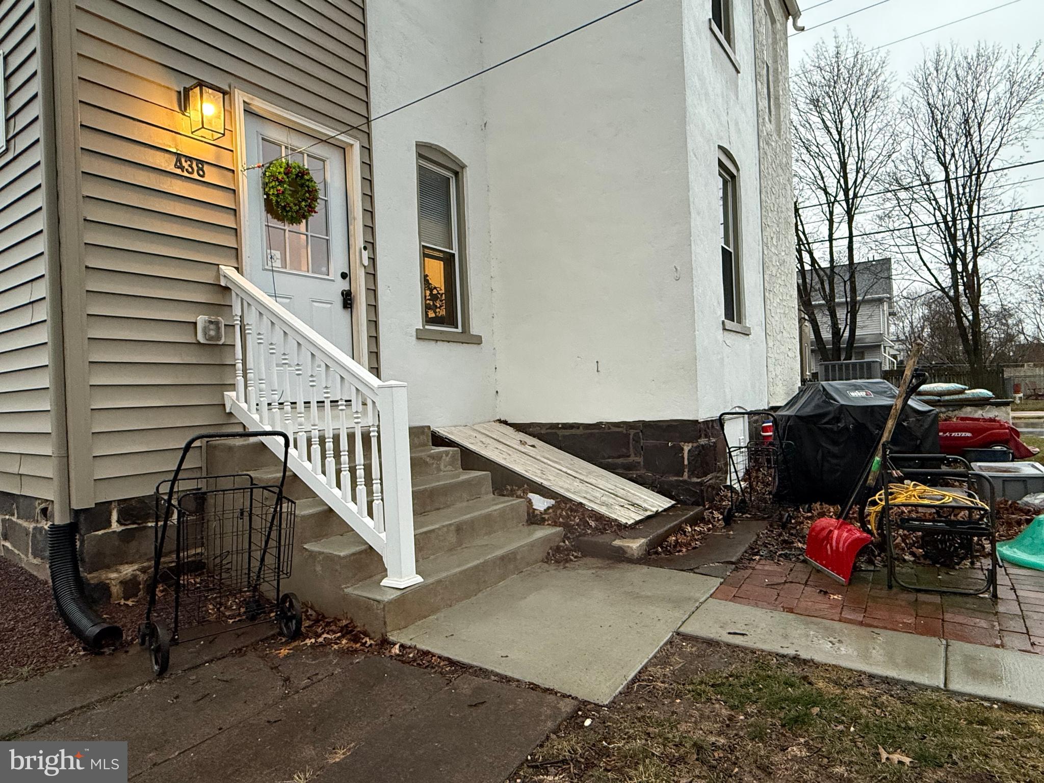 438 Main Street Red Hill, PA 18076 - Photo 26 of 29 a view of a patio with table and chairs and wooden fence