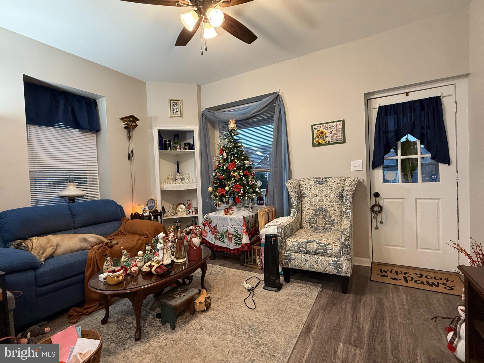 438 Main Street Red Hill, PA 18076 - Photo 8 of 29 a living room with furniture and a flat screen tv