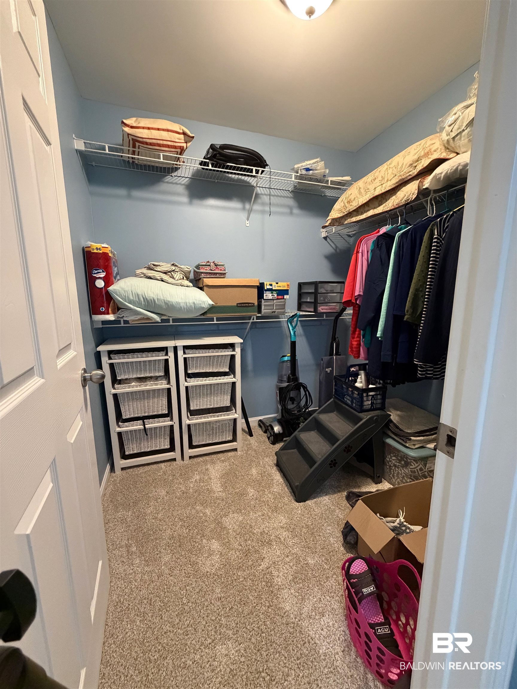 1517 Regency Road, Unit 71 Gulf Shores, AL 36542 - Photo 25 of 26 Walk in closet with light colored carpet