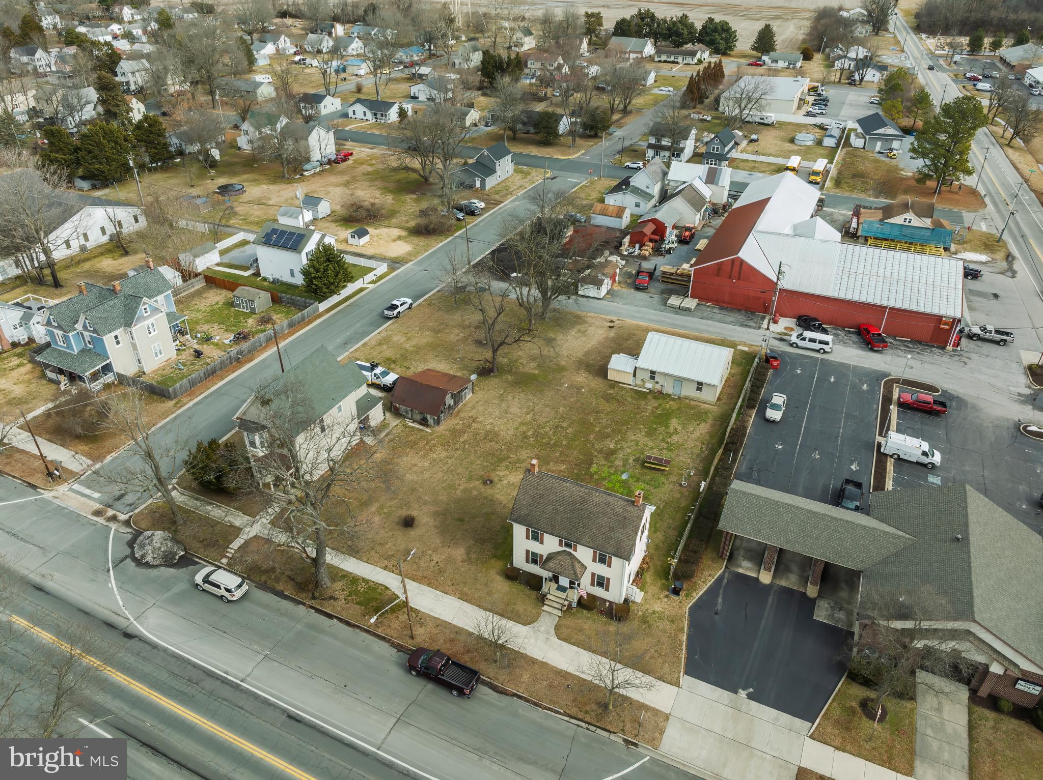 504 Central Avenue Ridgely, MD 21660 - Photo 12 of 38 an aerial view of residential houses with outdoor space