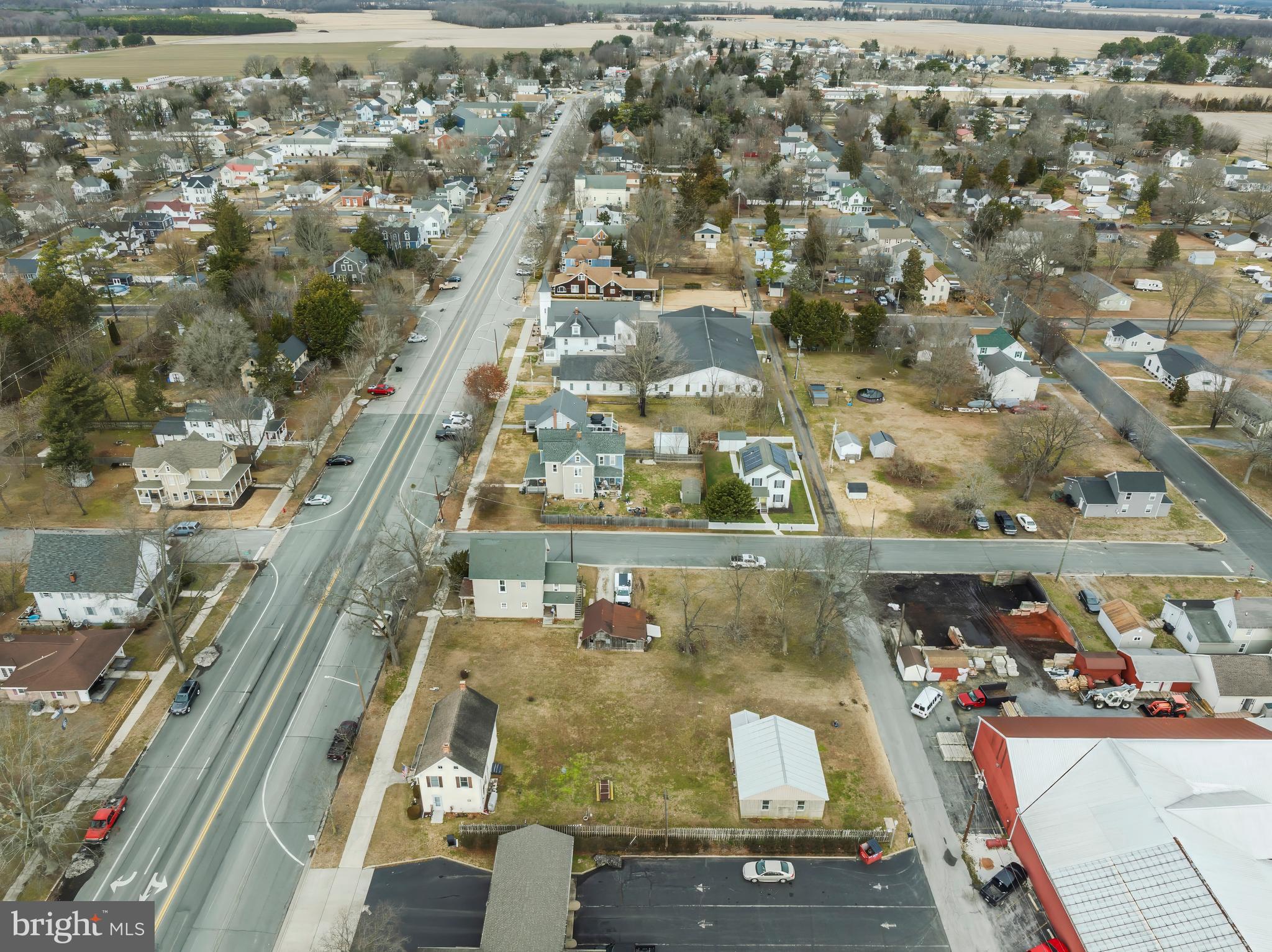 504 Central Avenue Ridgely, MD 21660 - Photo 15 of 38 an aerial view of residential houses with outdoor space