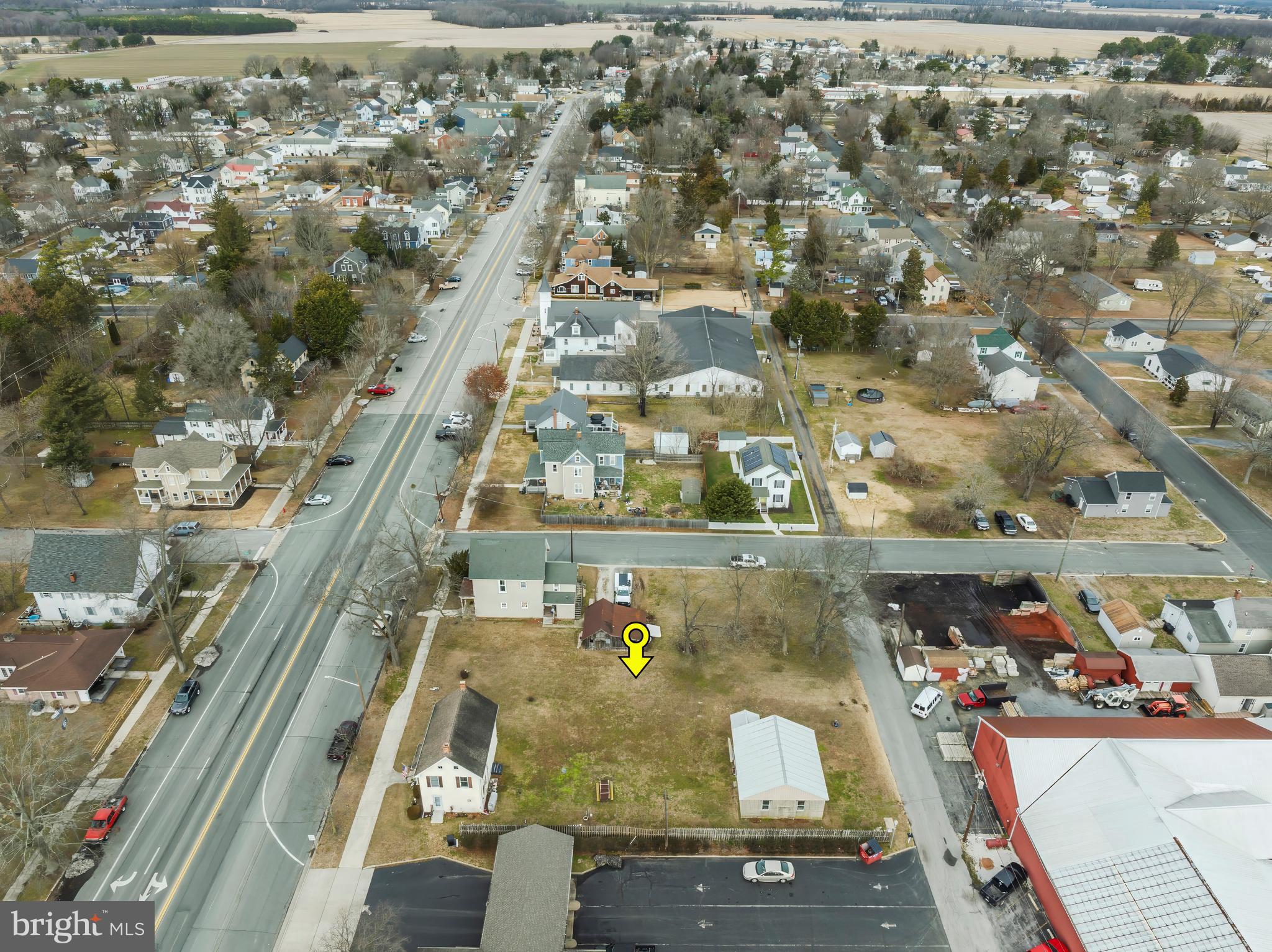 504 Central Avenue Ridgely, MD 21660 - Photo 16 of 38 an aerial view of residential houses with outdoor space
