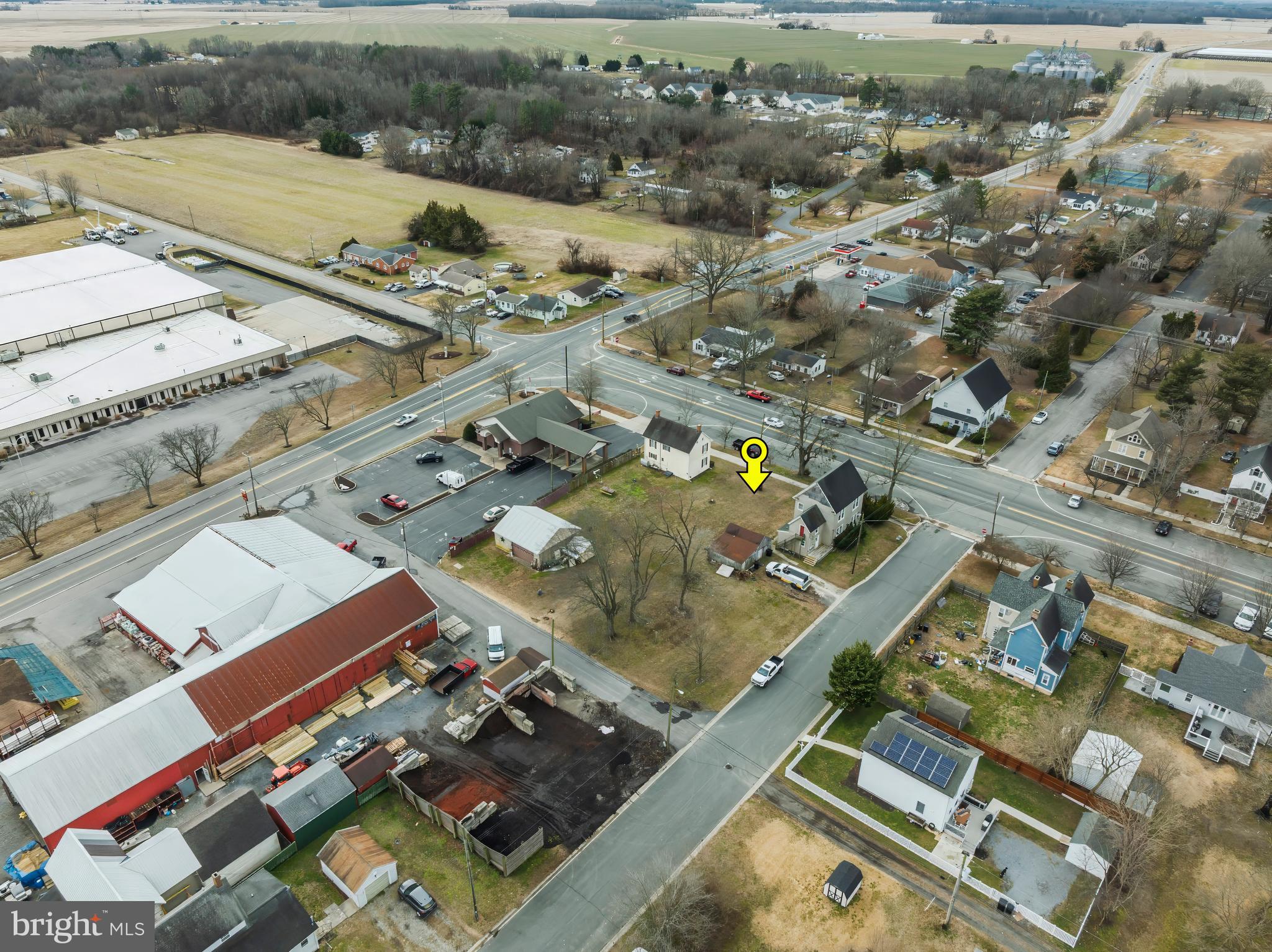 504 Central Avenue Ridgely, MD 21660 - Photo 22 of 38 an aerial view of residential houses with outdoor space