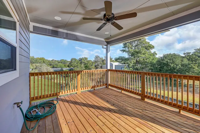 a view of a balcony with furniture