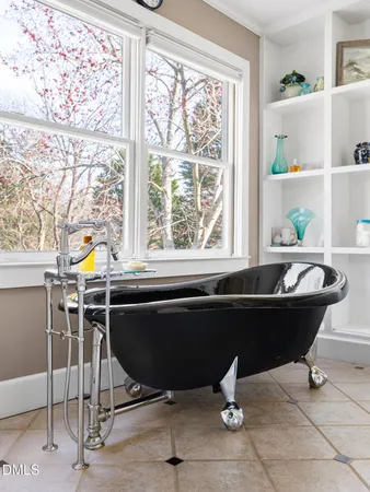 a bathroom with a bathtub and a sink