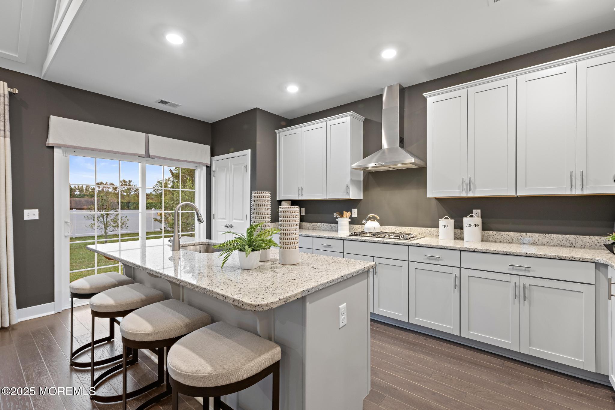 1 Canterbury Road New Egypt, NJ 08533 - Photo 14 of 40 a kitchen with a table chairs sink and cabinets