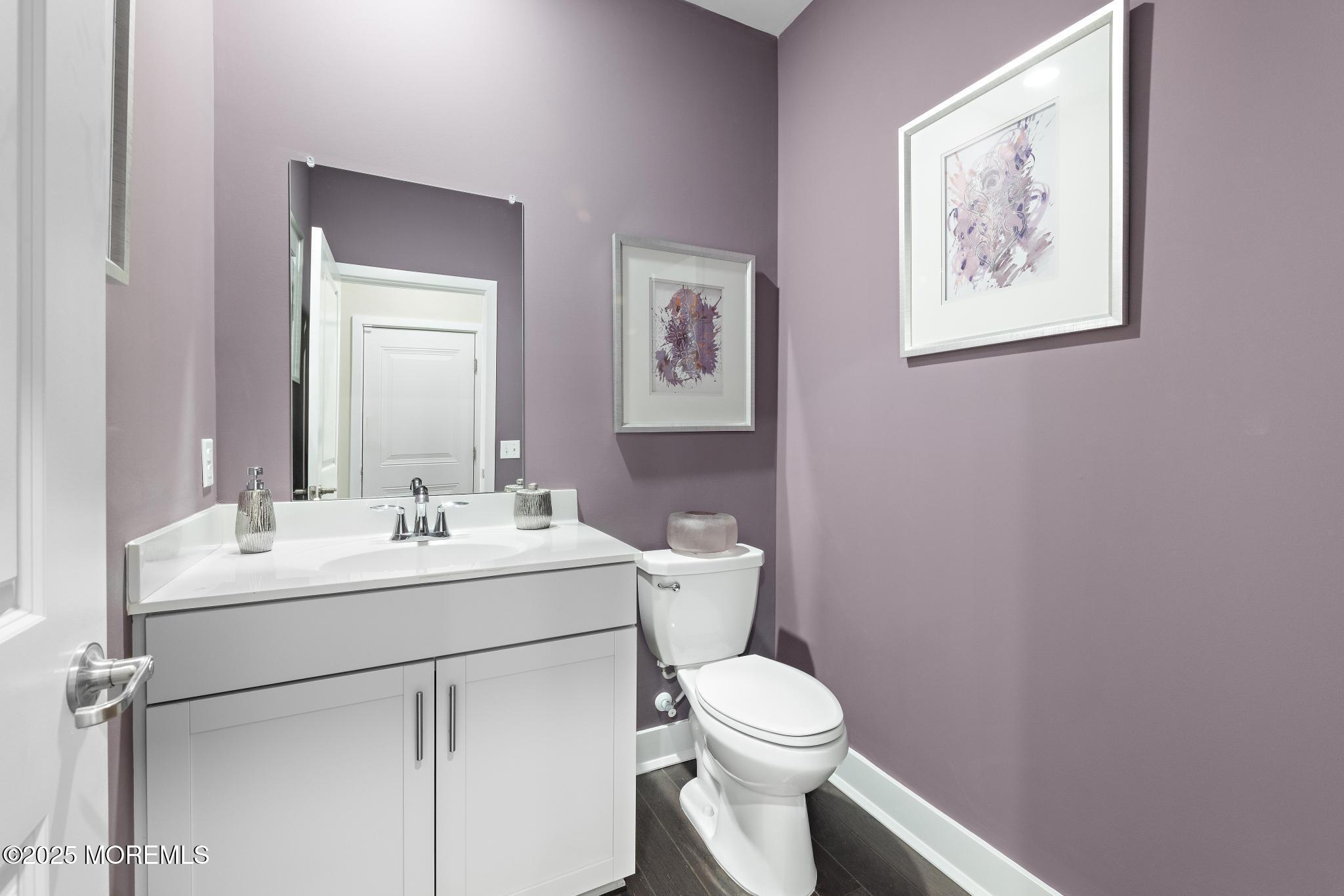 1 Canterbury Road New Egypt, NJ 08533 - Photo 23 of 40 a bathroom with a toilet sink and mirror