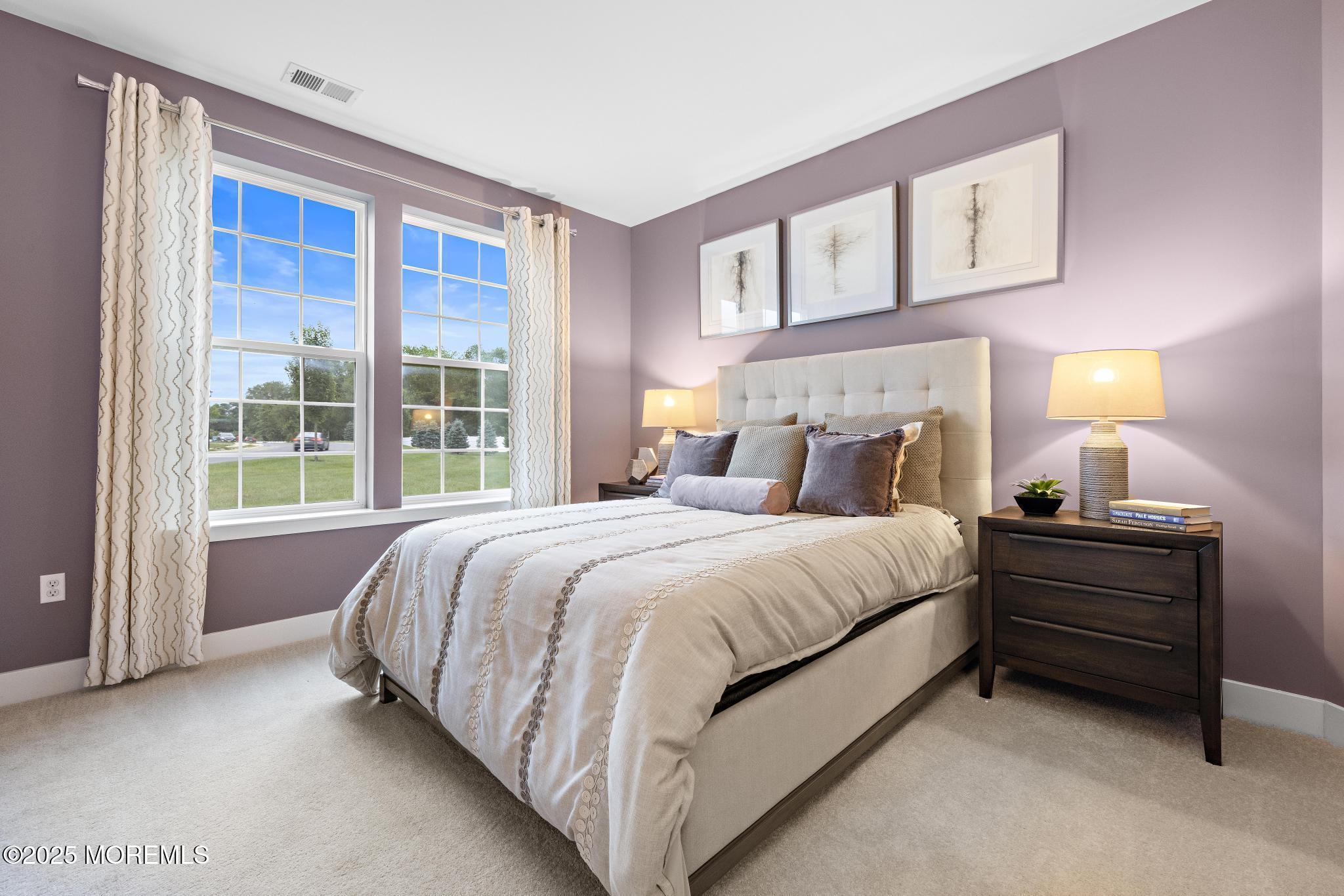 1 Canterbury Road New Egypt, NJ 08533 - Photo 24 of 40 a bed sitting in a bedroom next to a window