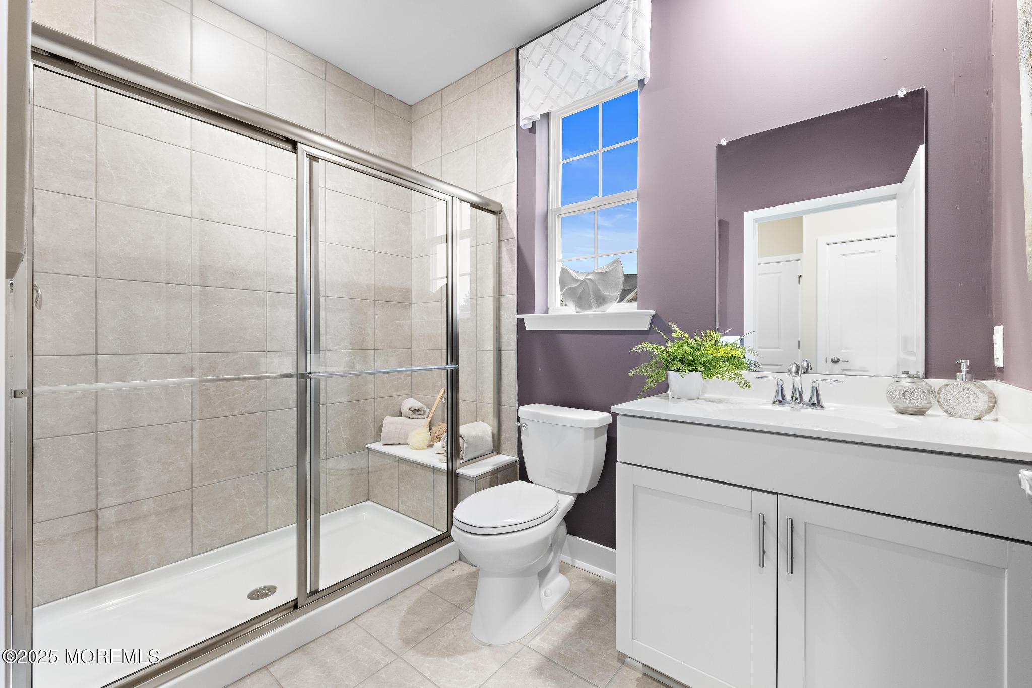 1 Canterbury Road New Egypt, NJ 08533 - Photo 25 of 40 a bathroom with a sink a toilet and shower