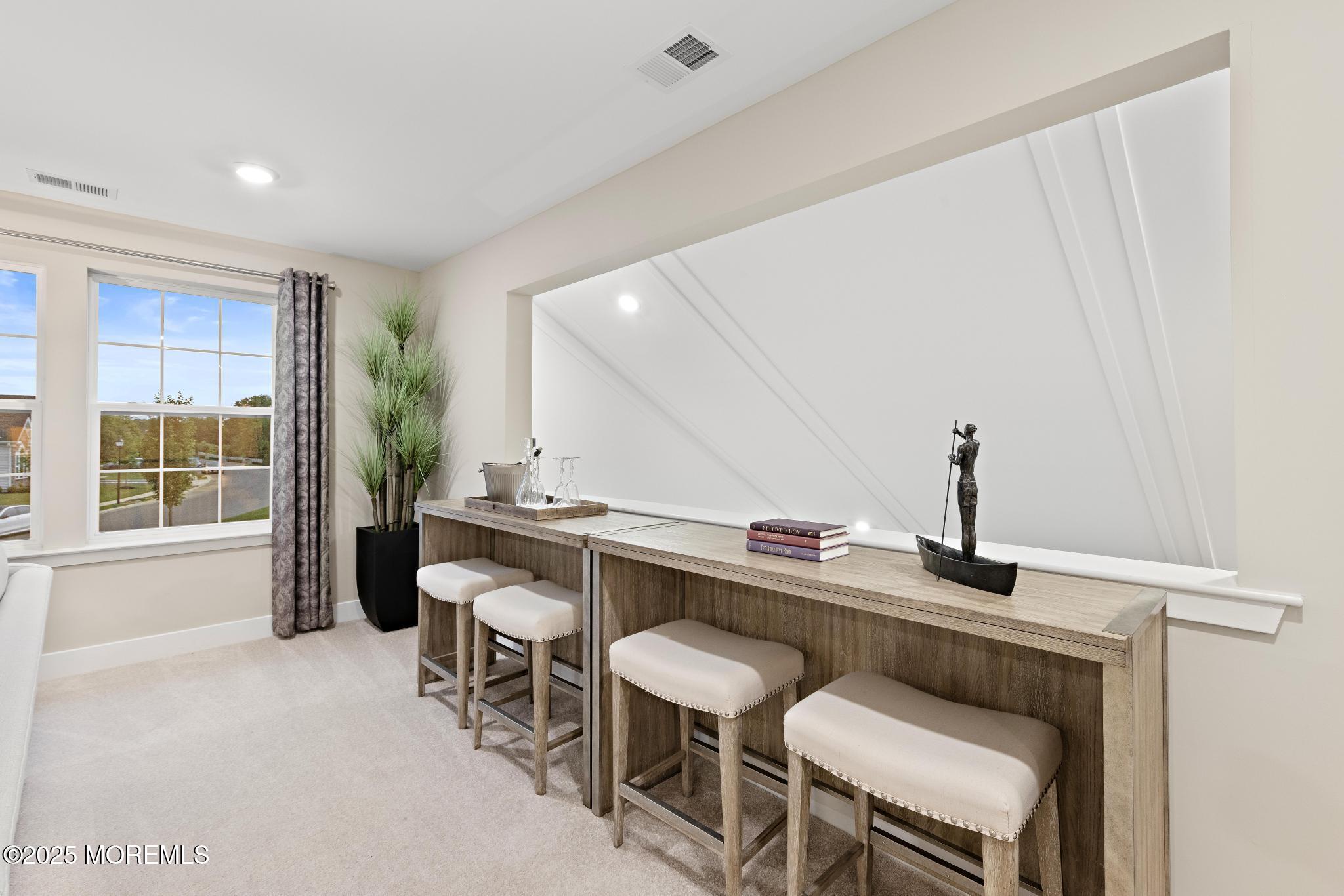 1 Canterbury Road New Egypt, NJ 08533 - Photo 27 of 40 a room with a table chairs and a window