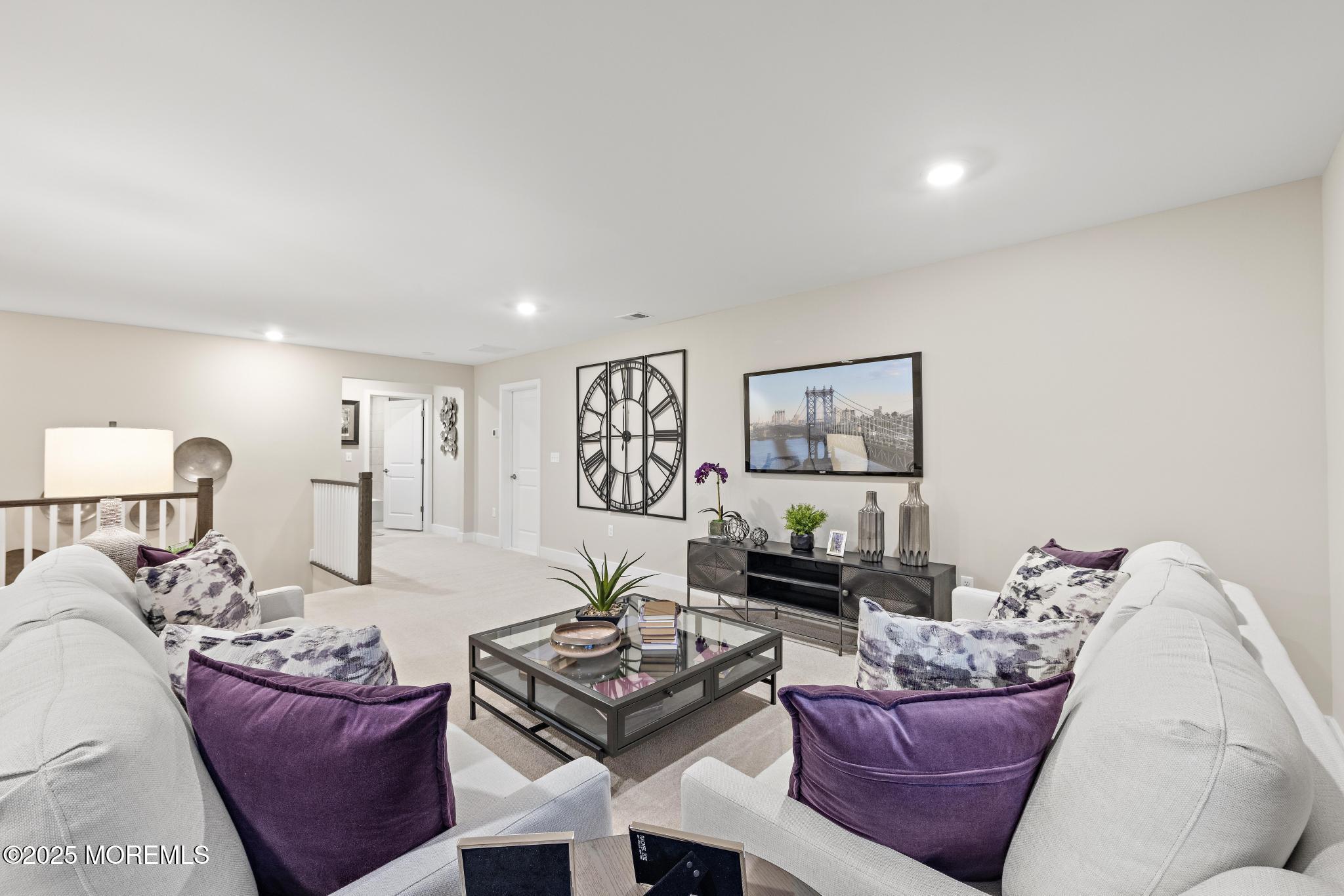 1 Canterbury Road New Egypt, NJ 08533 - Photo 33 of 40 a living room with furniture and wooden floor