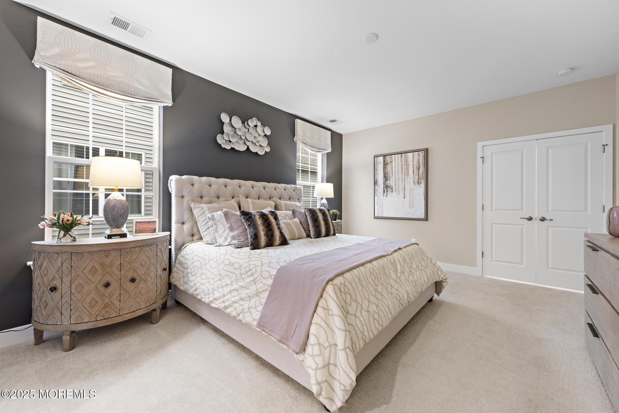 1 Canterbury Road New Egypt, NJ 08533 - Photo 34 of 40 a spacious bedroom with a bed and window