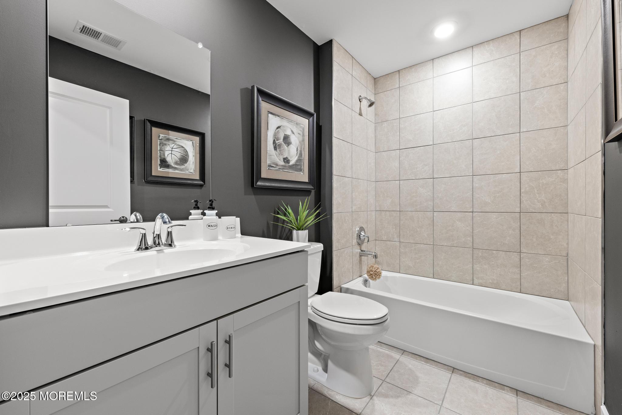 1 Canterbury Road New Egypt, NJ 08533 - Photo 37 of 40 a bathroom with a sink a toilet and shower