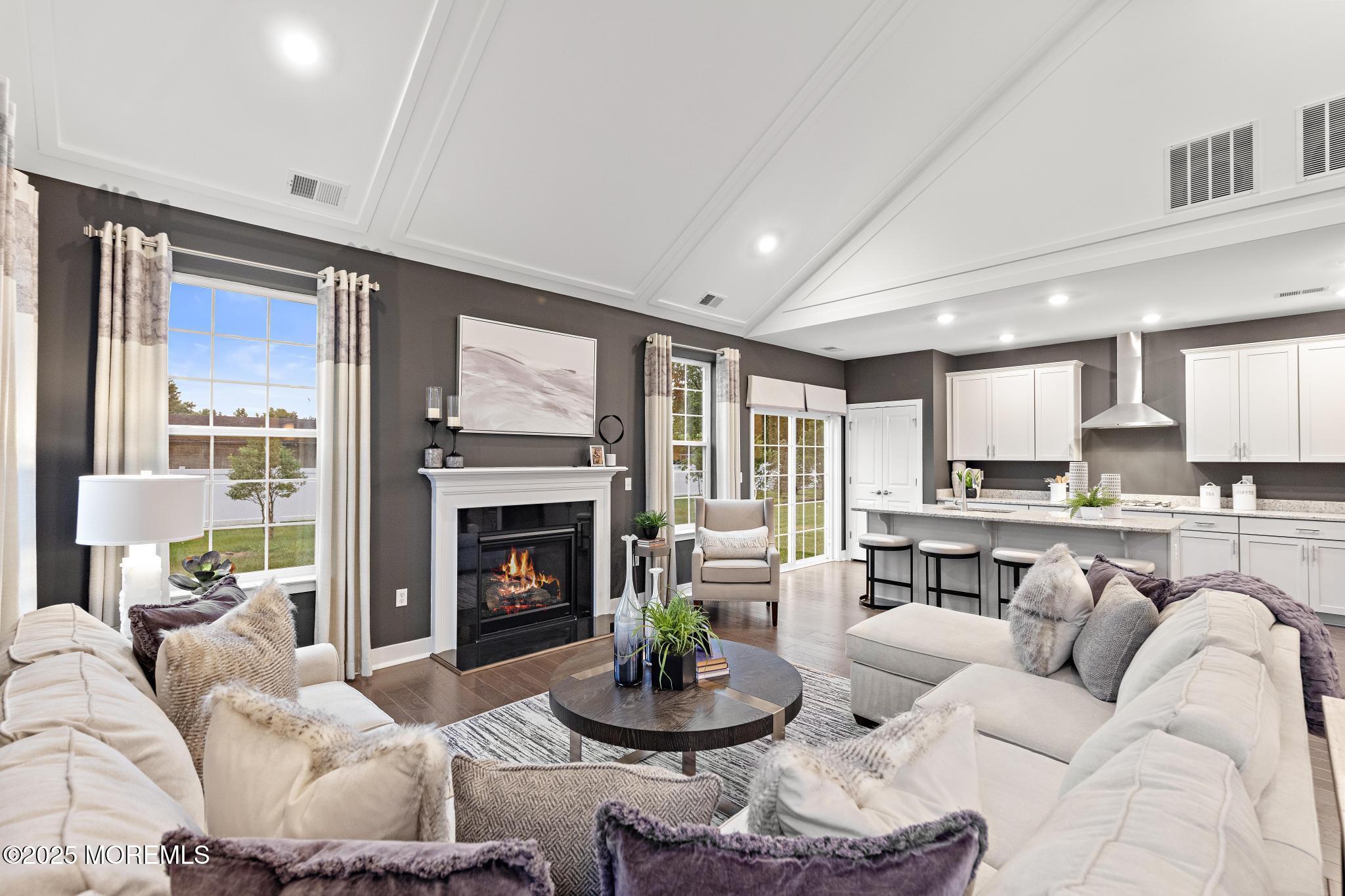 1 Canterbury Road New Egypt, NJ 08533 - Photo 7 of 40 a living room with furniture fireplace and a large window