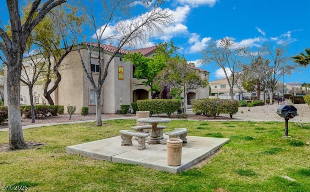 7885 West Flamingo Road, Unit 1008 Las Vegas, NV 89147 - Photo 9 of 29 A well-maintained community offers an inviting outdoor seating area and barbecue.