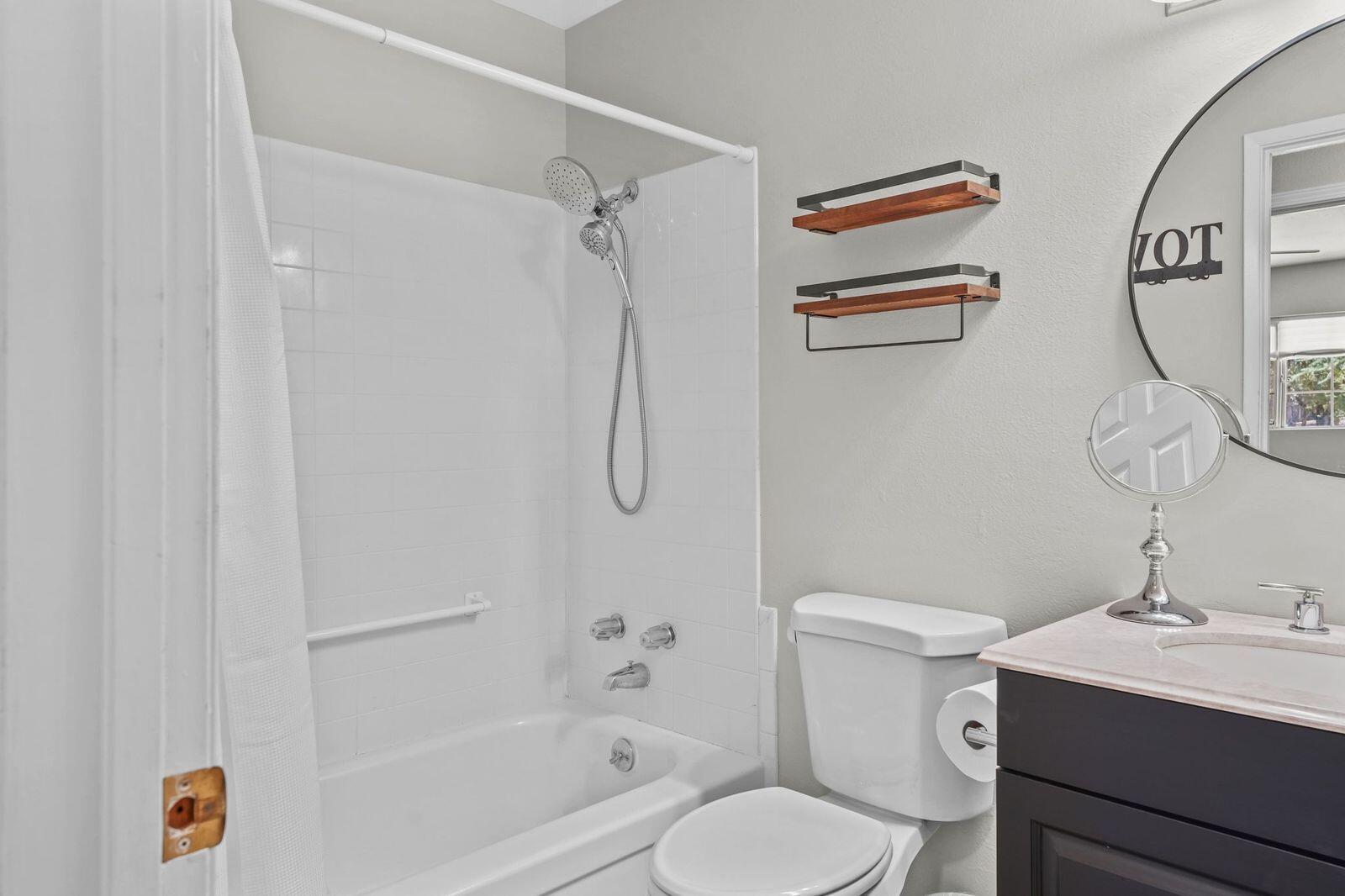 8710 Redbank Road Redding, CA 96001 - Photo 18 of 27 a bathroom with a sink toilet and shower