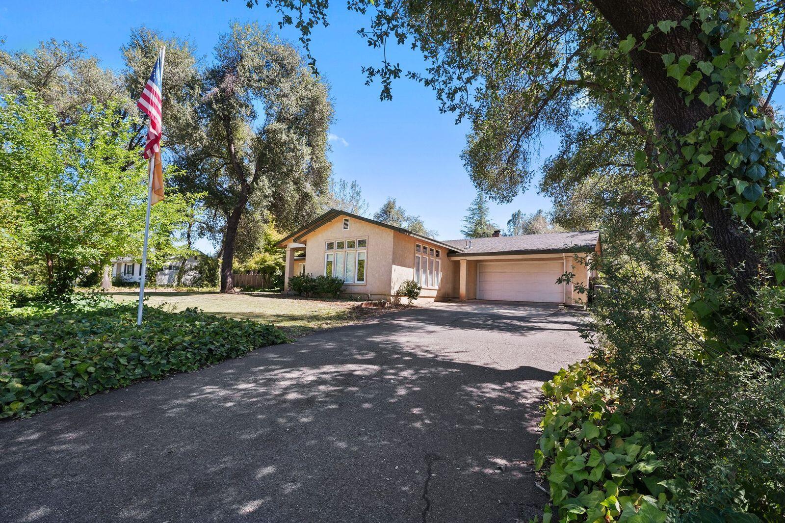 8710 Redbank Road Redding, CA 96001 - Photo 4 of 27 a view of backyard of house with green space