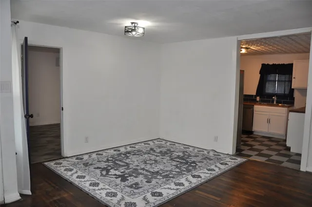 wooden floor in a hall with an entryway