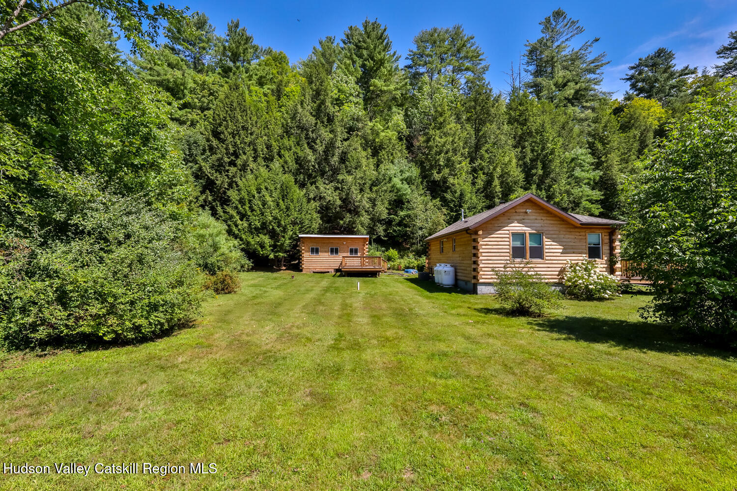 10398 Highway 23A Jewett, NY 12442 - Photo 12 of 55 a front view of a house with yard and green space
