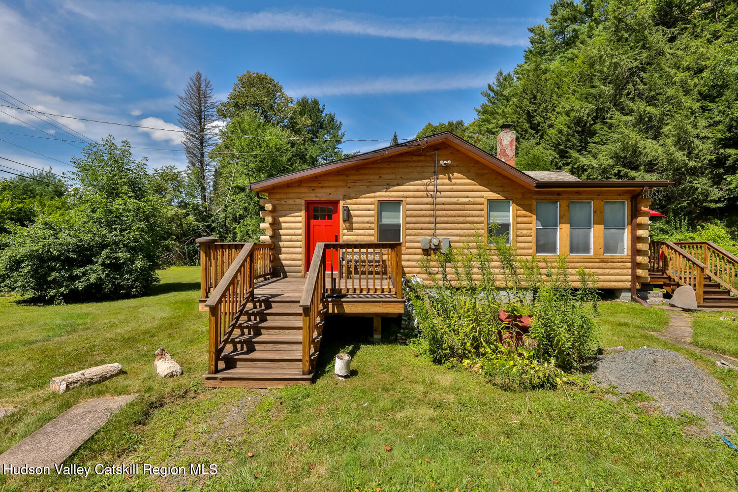 10398 Highway 23A Jewett, NY 12442 - Photo 13 of 55 a front view of a house with a yard