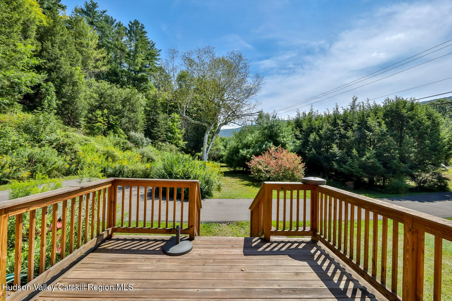 10398 Highway 23A Jewett, NY 12442 - Photo 16 of 55 a view of balcony with wooden floor and fence