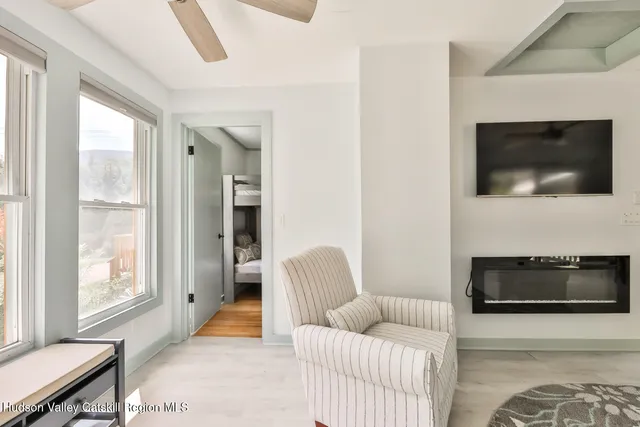 a kitchen with stainless steel appliances a sink stove and refrigerator