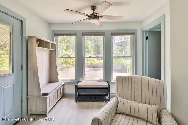 a bathroom with a toilet a sink and shower