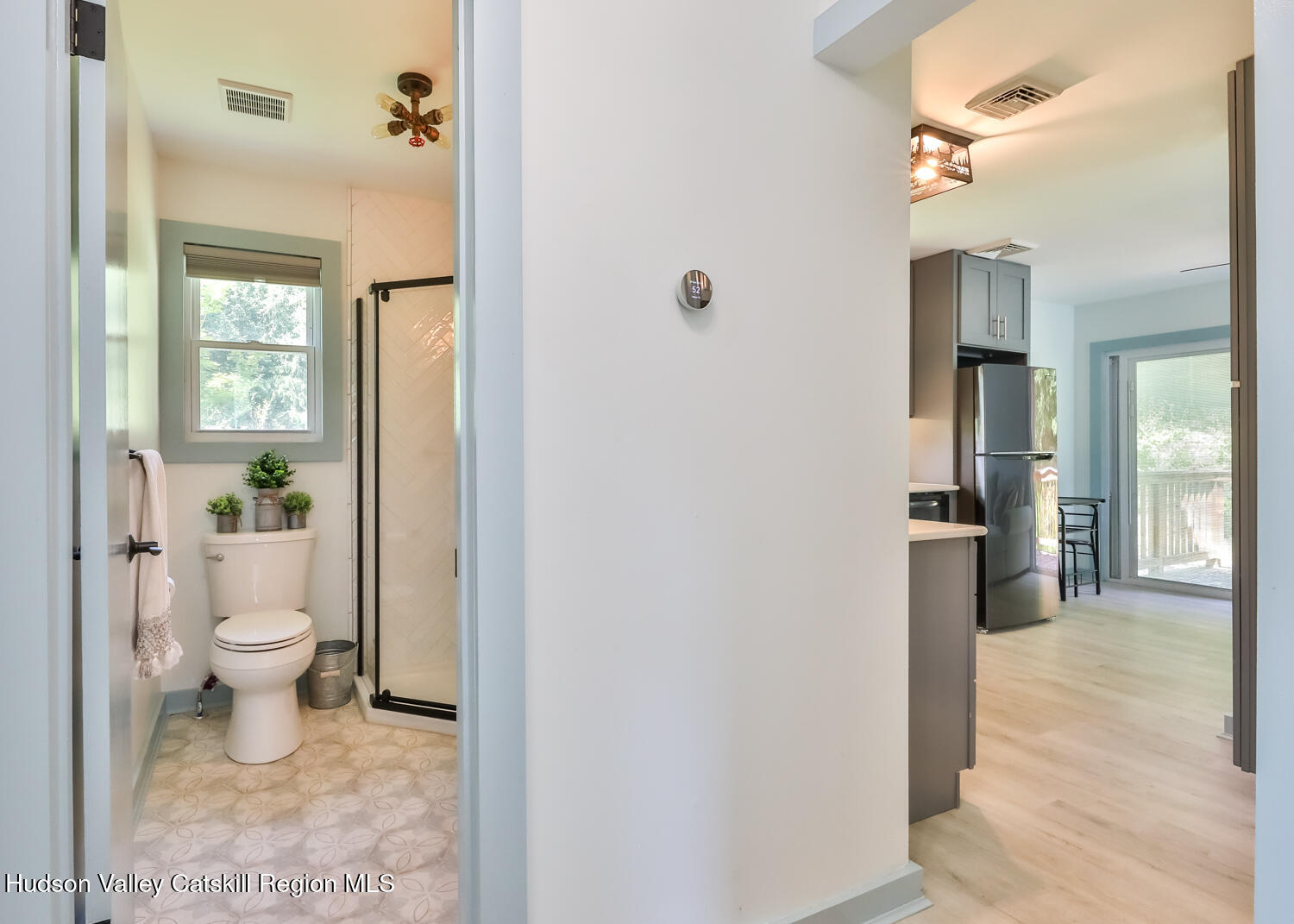10398 Highway 23A Jewett, NY 12442 - Photo 29 of 55 a bathroom with a toilet a sink and shower
