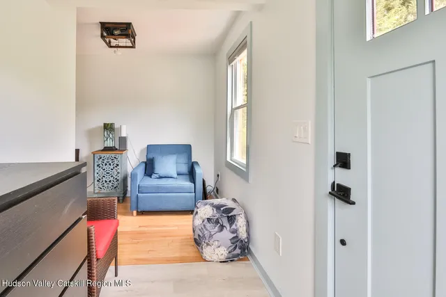 a bathroom with a double vanity sink and a large mirror
