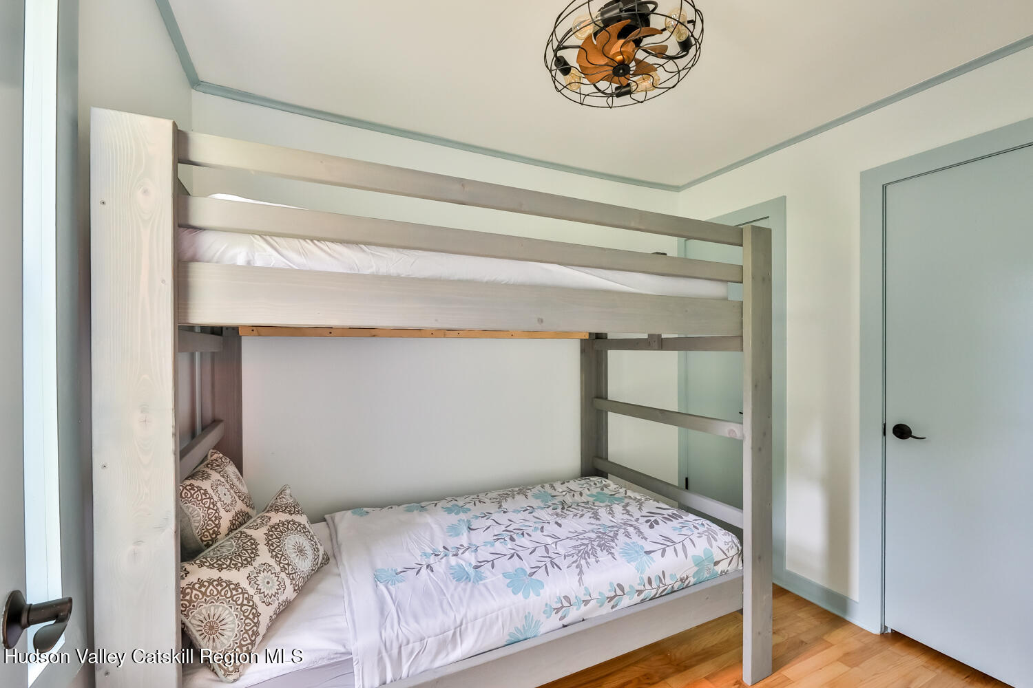 10398 Highway 23A Jewett, NY 12442 - Photo 34 of 55 a bedroom with a bed and a painting on the wall