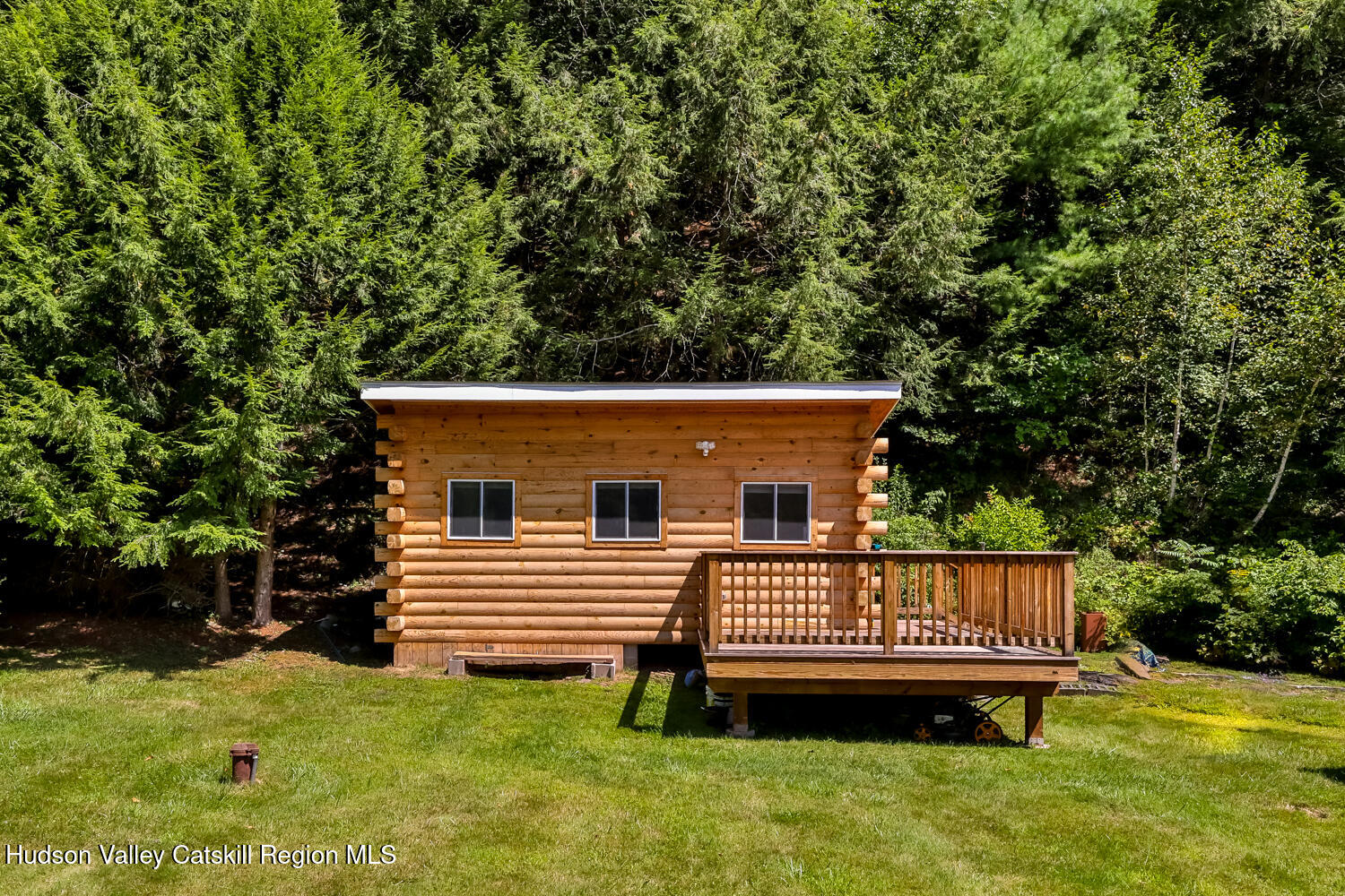 10398 Highway 23A Jewett, NY 12442 - Photo 38 of 55 a view of a house with a yard and sitting area