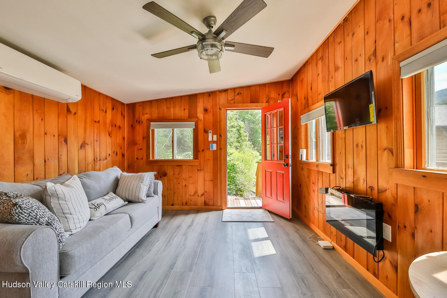 10398 Highway 23A Jewett, NY 12442 - Photo 42 of 55 a living room with furniture and a large window