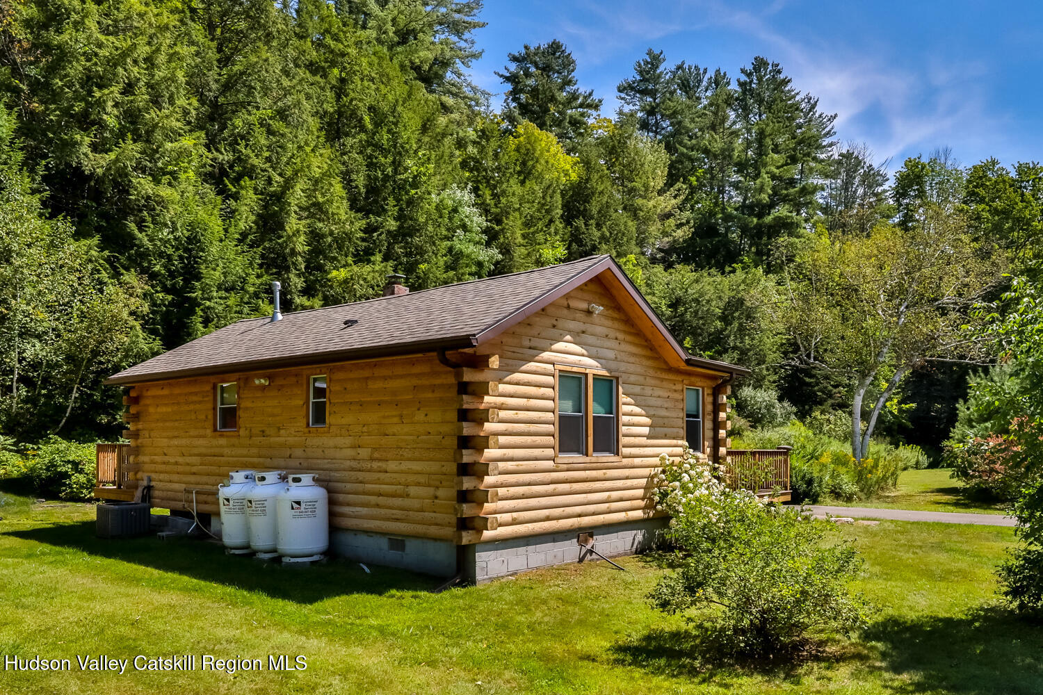 10398 Highway 23A Jewett, NY 12442 - Photo 49 of 55 a view of a house with a backyard
