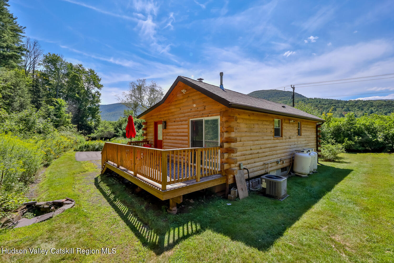 10398 Highway 23A Jewett, NY 12442 - Photo 50 of 55 a view of a house with a yard