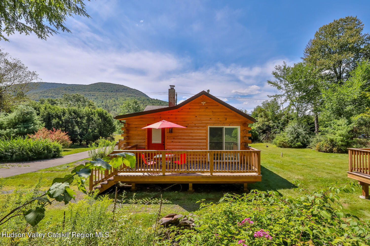 10398 Highway 23A Jewett, NY 12442 - Photo 51 of 55 a view of a house with swimming pool next to a yard