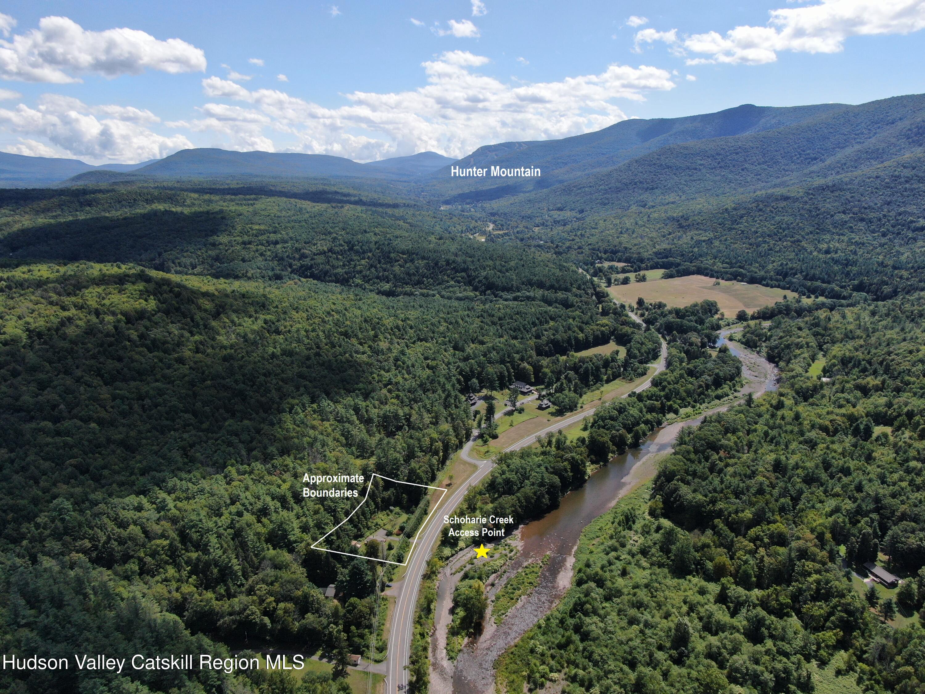 10398 Highway 23A Jewett, NY 12442 - Photo 7 of 55 a view of a city with lush green forest