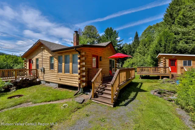 a view of deck with wooden floor and outdoor seating