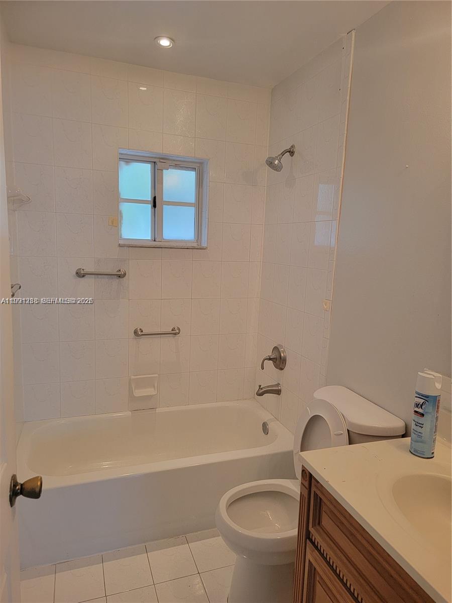 3333 Southwest 156th Court Miami, FL 33185 - Photo 14 of 33 a bathroom with a sink a bathtub and a toilet