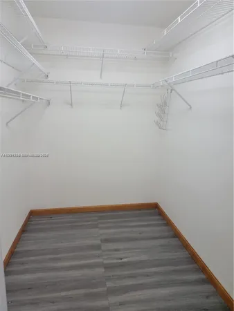 a view of a room with racks on the wall