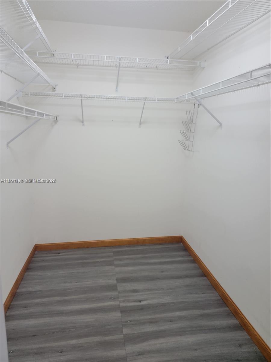 3333 Southwest 156th Court Miami, FL 33185 - Photo 17 of 33 a view of a room with racks on the wall