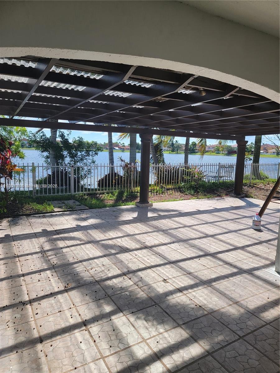 3333 Southwest 156th Court Miami, FL 33185 - Photo 23 of 33 a view of an empty room with a small yard