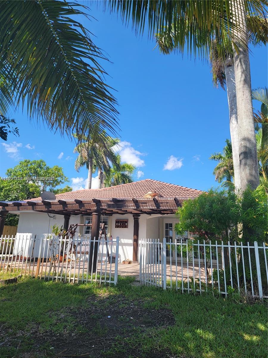 3333 Southwest 156th Court Miami, FL 33185 - Photo 24 of 33 a view of a house with a yard
