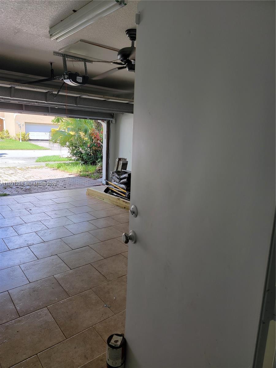 3333 Southwest 156th Court Miami, FL 33185 - Photo 6 of 33 a view of room with a window and a ceiling fan