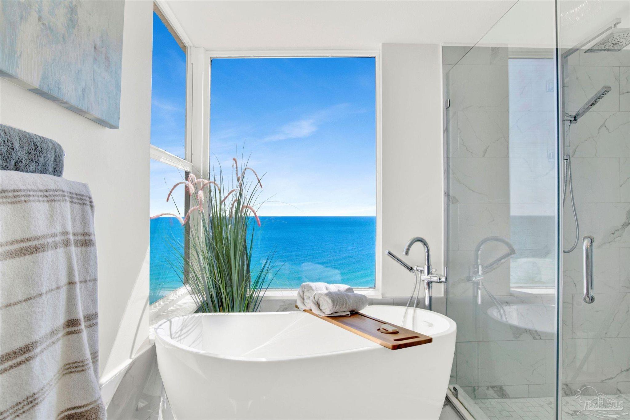 13601 Perdido Key Drive, Unit W10B Pensacola, FL 32507 - Photo 13 of 25 a bathroom with a sink and a mirror