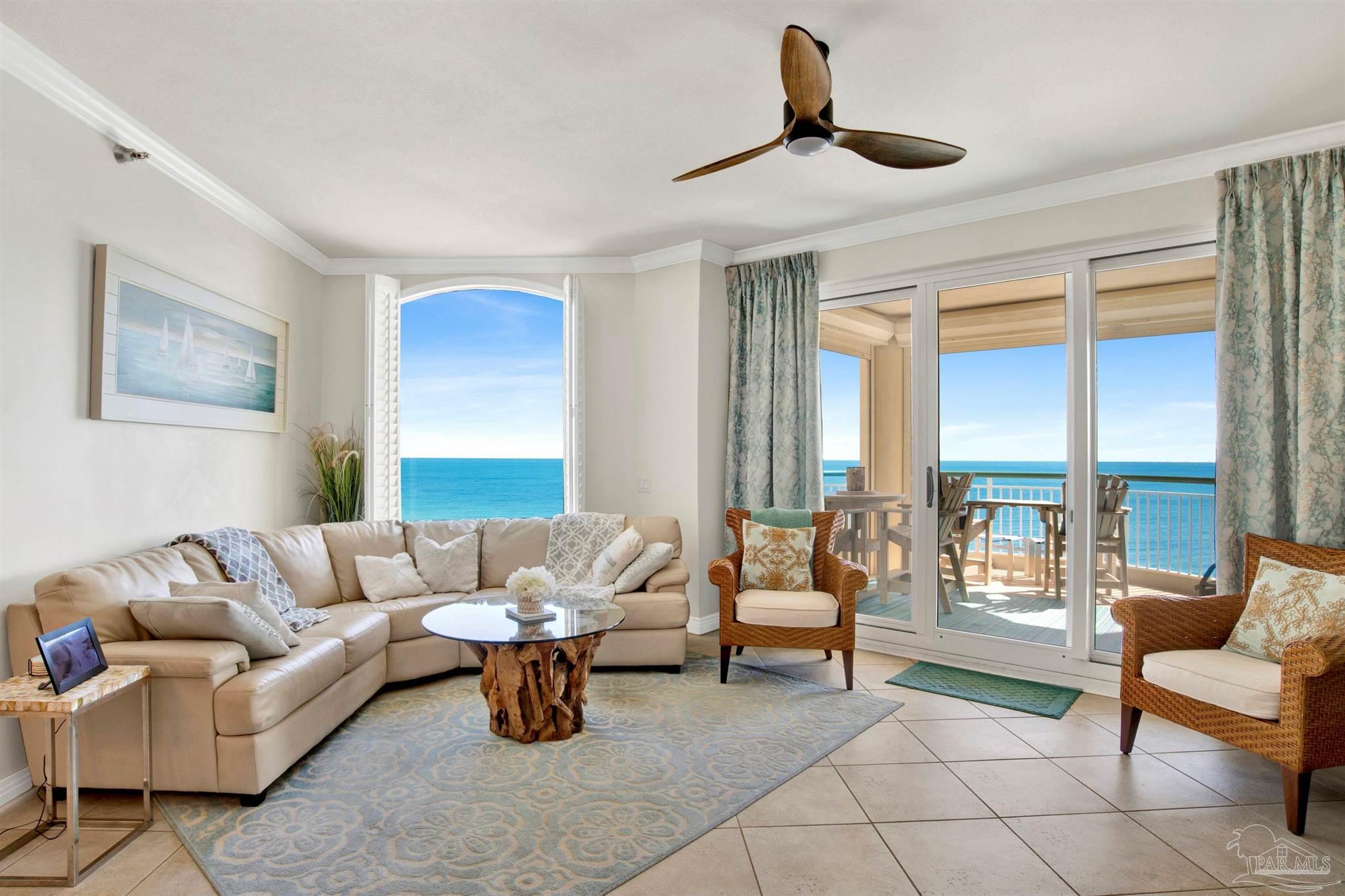 13601 Perdido Key Drive, Unit W10B Pensacola, FL 32507 - Photo 4 of 25 a living room with furniture and floor to ceiling window