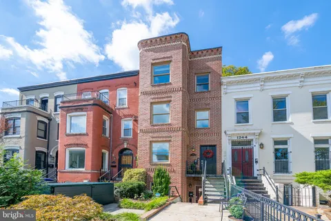 a front view of a multi story residential apartment building