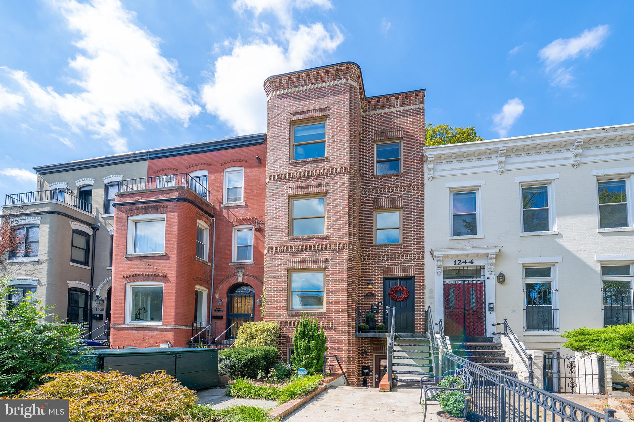 a front view of a multi story residential apartment building