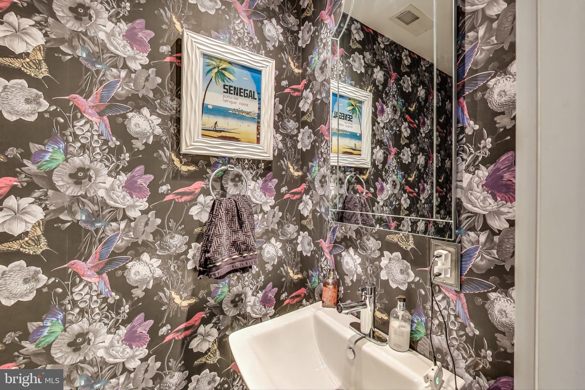 1242 New Jersey Avenue Northwest Washington, DC 20001 - Photo 10 of 60 a bathroom with a sink and mirror