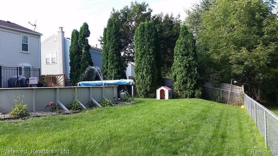 689 Worthington Road Canton, MI 48188 - Photo 27 of 30 Pool_Yard.jpg